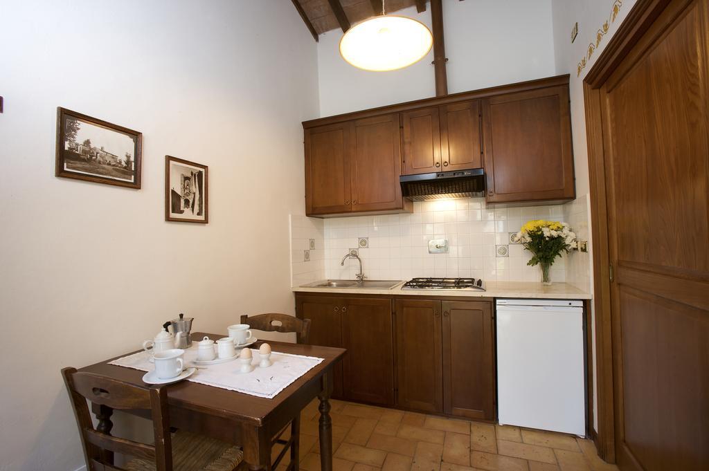Brigolante Guest Apartments Asís Habitación foto