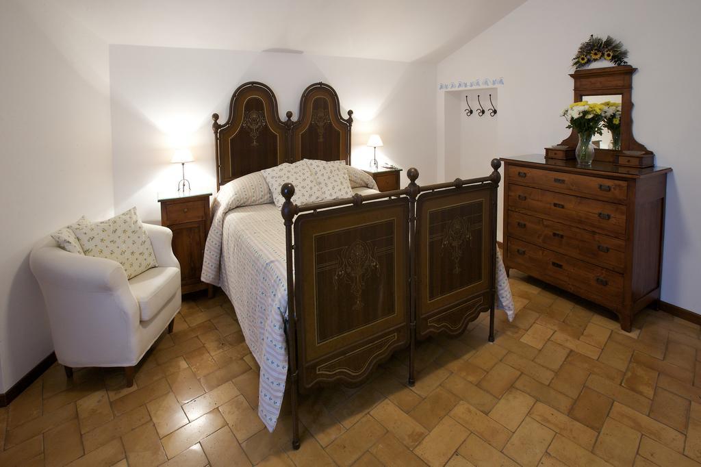Brigolante Guest Apartments Asís Habitación foto