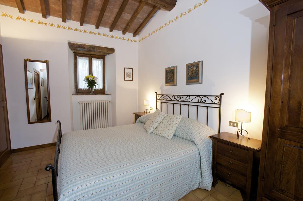 Brigolante Guest Apartments Asís Habitación foto